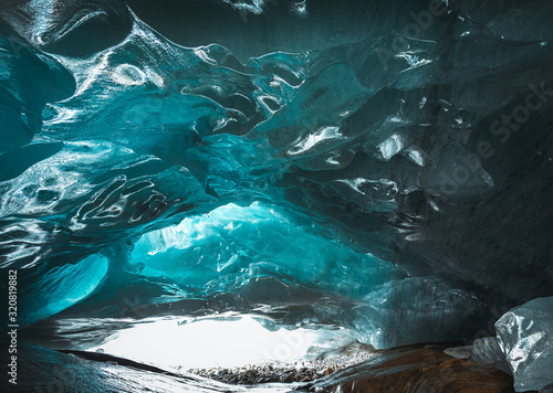 patterns on the ice ceiling inside the glacial cave of the Alibek mountain glacier