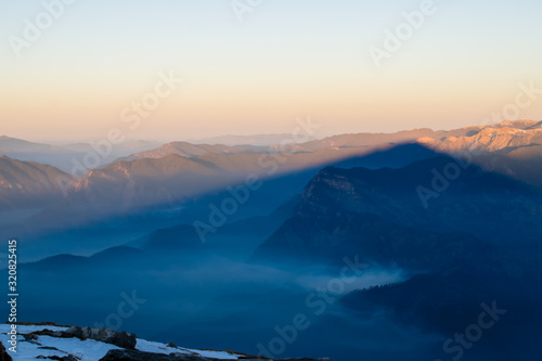 Stunning landscape before sunrise from Kedarkantha peak in Himalaya. Shot taken during winter trek to Kedarkantha, Uttarakhand(India) on New year