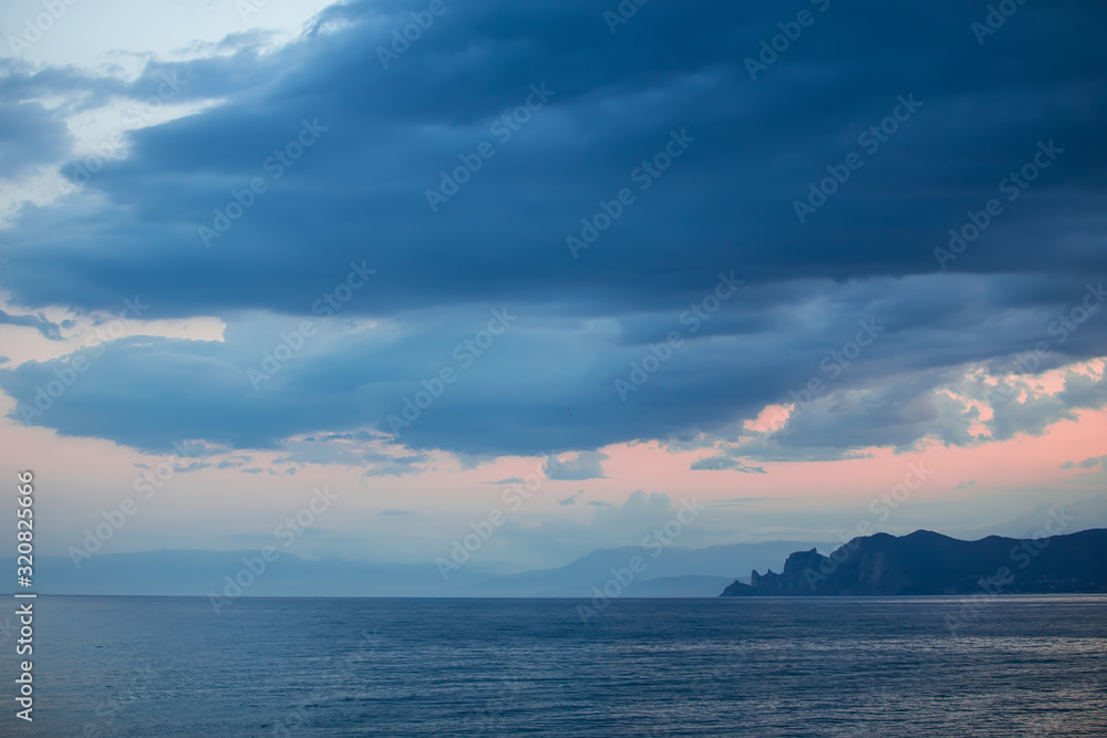 cloudy sky over the sea at sunset