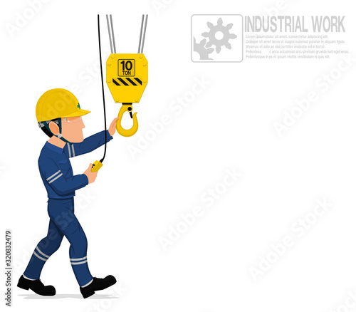 A worker is operating electrical crane