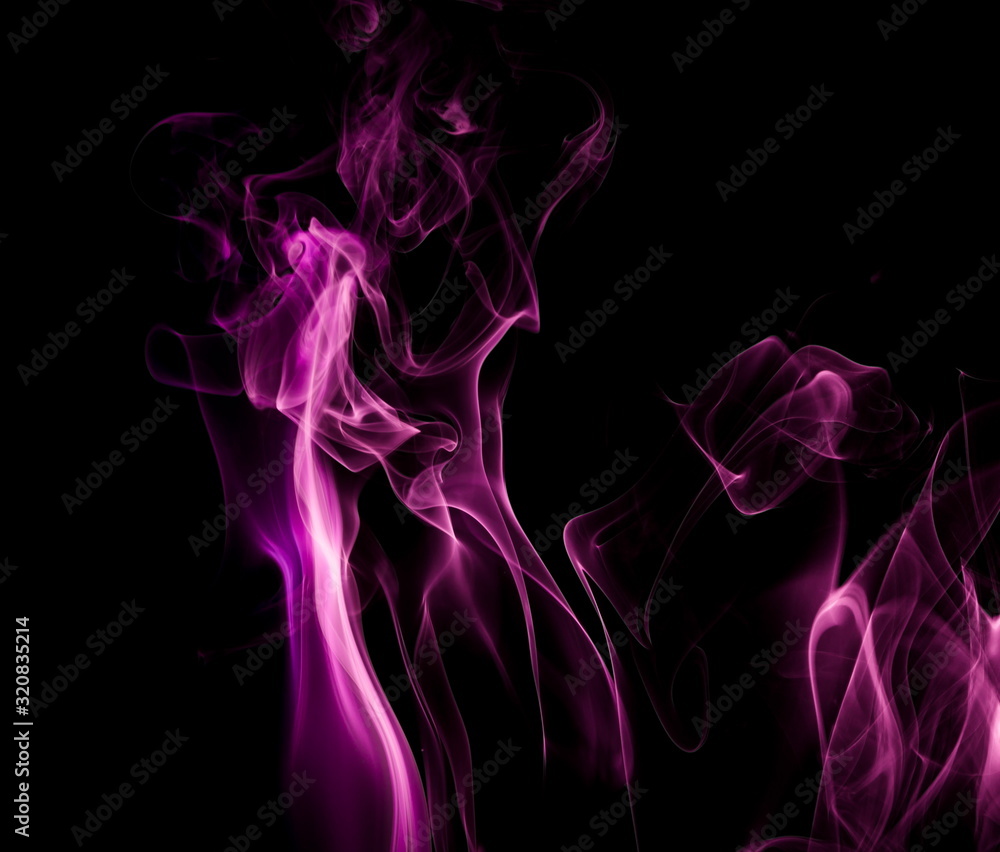 Obraz premium Purple smoke on black background
