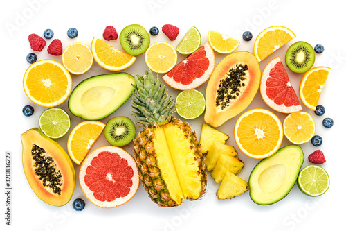 Fresh fruit healthy diet concept. Tropical mixed citrus food background, pineapple, orange isolated on white. Colorful fruits berries. Dieting health meal vegetarian health concept, top view