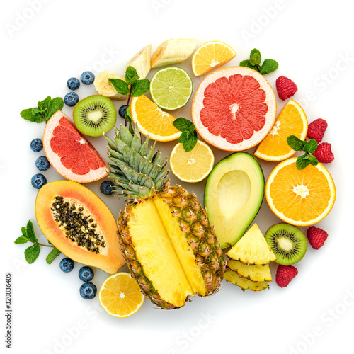 Fototapeta Naklejka Na Ścianę i Meble -  Fresh fruit healthy diet concept. Tropical mixed citrus food background, pineapple, orange isolated on white. Colorful fruits berries. Dieting health meal vegetarian health concept, top view