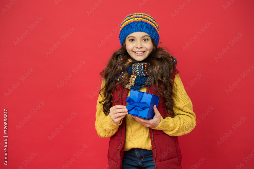 Pick some winter gifts for yourself. Wish list. Feeling grateful. Holidays season. Happy childhood. Christmas gifts and souvenirs. Winter holidays. Happy kid in winter outfit red background Pick some winter gifts for yourself. Wish list. Feeling grateful. Holidays season. Happy childhood. Christmas gifts and souvenirs. Winter holidays. Happy kid in winter outfit red background