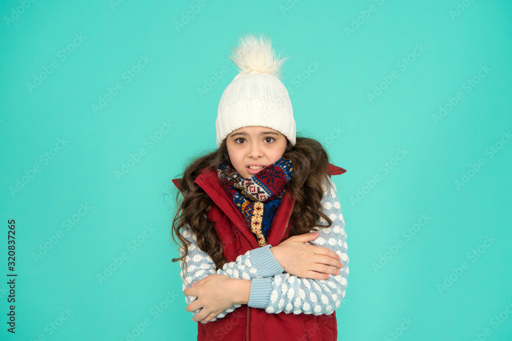 Winter flu. feeling cold this season. Dress in layers and wear hat. Stay active. it is cold outside. kid warm knitwear. winter vibes. Portrait of girl hipster. Youth street fashion. Feeling cozy