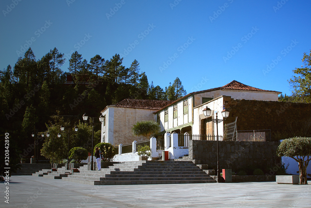 Historic house in colonial architectural style with traditional wooden Canarian windows in Villaflor (Tenerife, Spain)