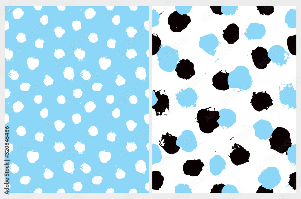 Fototapeta premium Set of 2 Cute Abstract Dots Vector Pattern. White, Blue and Black Irregular Brush Dots on a White and Blue Backgrounds. Lovely Pastel Color Geometric Prints for Fabric, Textile, Wrapping Paper.