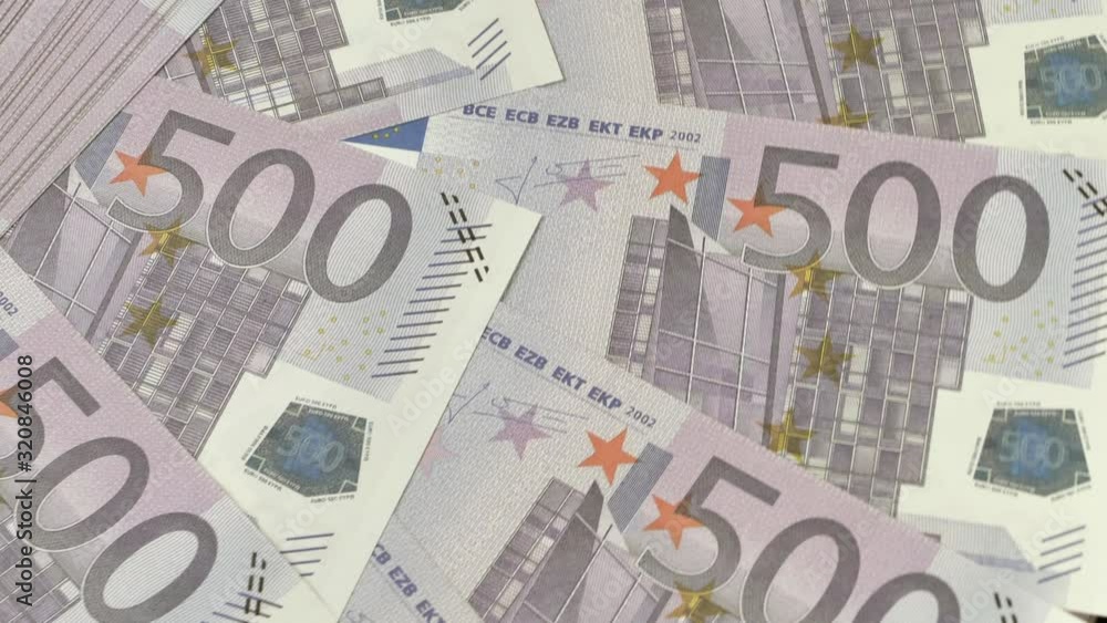 Many five hundred euro notes rotating in circle,close up shot Many five hundred euro notes rotating in circle,close up shot