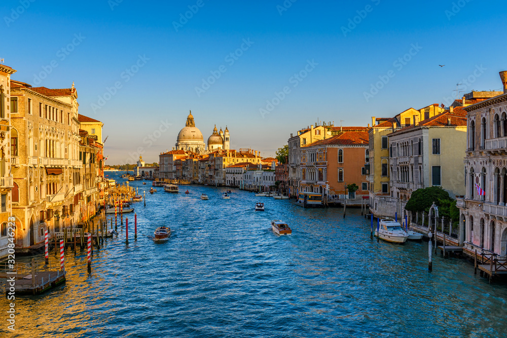 Grand Canal with Basilica di Santa Maria della Salute in Venice, Italy. View of Venice Grand Canal. Architecture and landmarks of Venice. Venice postcard