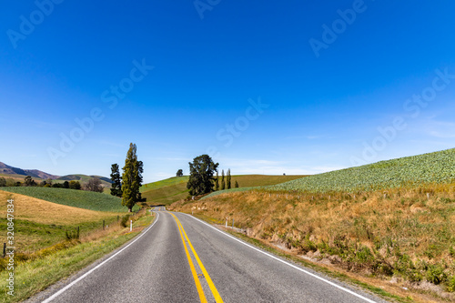 country road and sky in Newzealand © Ken Tyler
