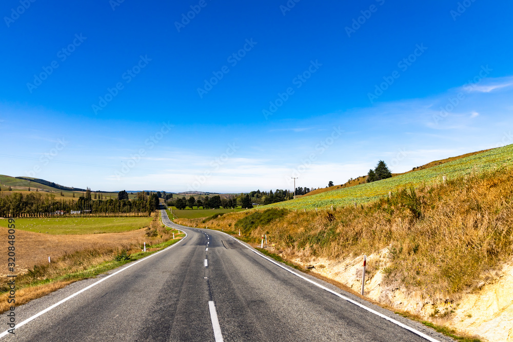country road and sky in Newzealand country road and sky in Newzealand