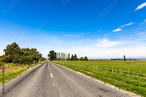 country road and sky in Newzealand © Ken Tyler