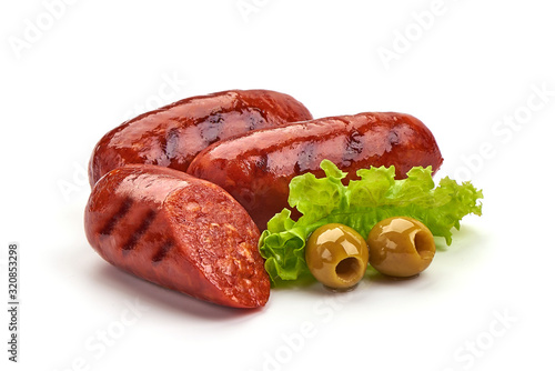 Grilled Spanish chorizo sausages, isolated on white background photo