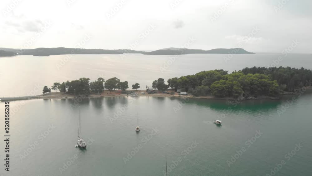 AERIAL: flying over the smal islands of Koukoumitsa near Vonitsa city Greece AERIAL: flying over the smal islands of Koukoumitsa near Vonitsa city Greece