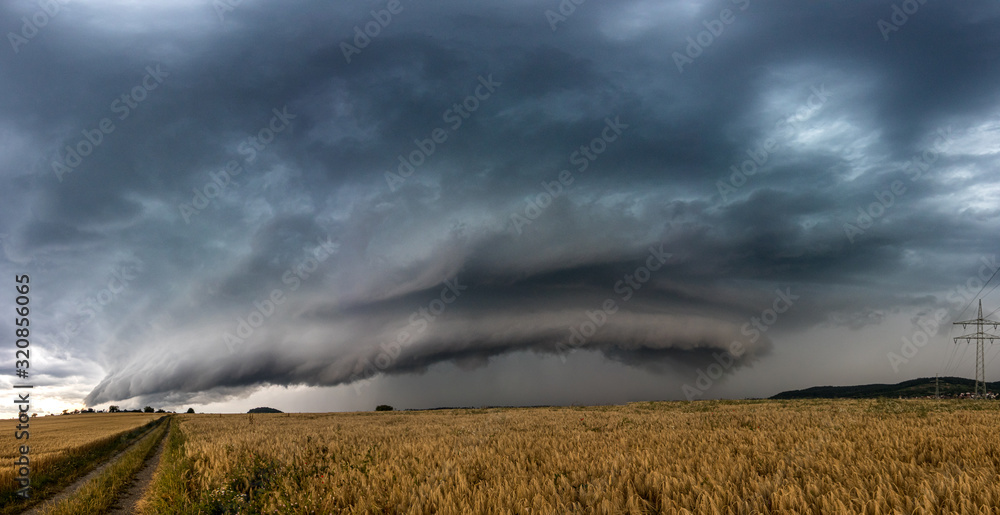 Wall Mural Beautiful supercell thunderstorm in the summer