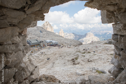 August 28, 2019: top view of Rifugio Boé with hikers in the summer season, Italian Dolomites