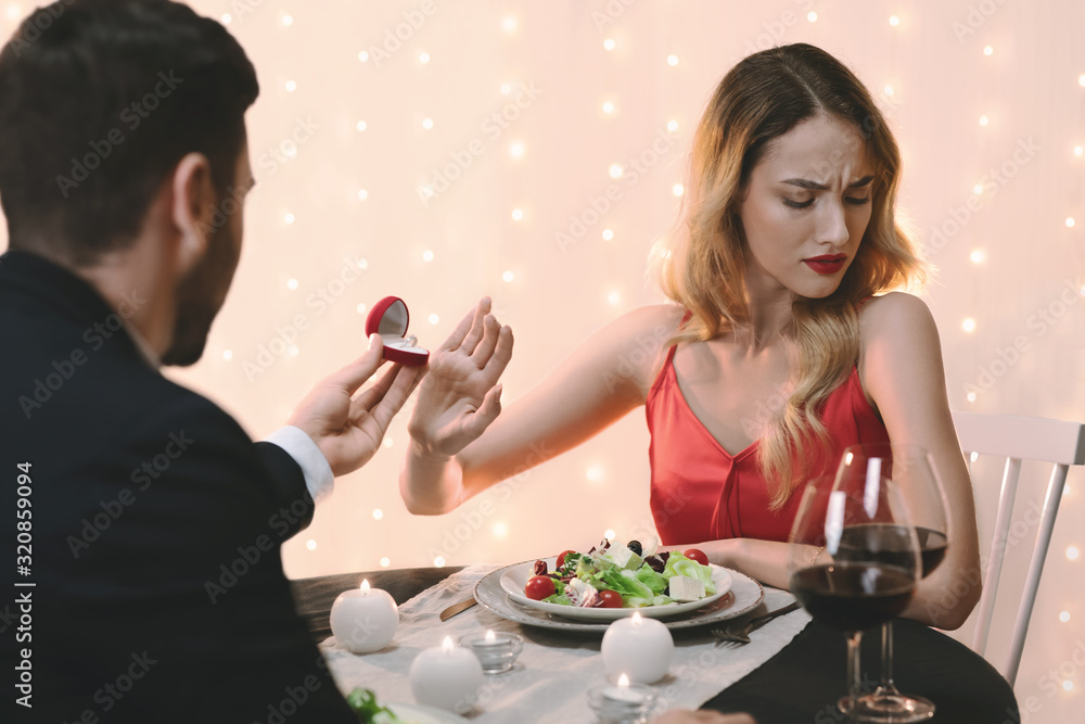 She Said No. Young Woman Refusing Marriage Proposal From Boyfriend She Said No. Young Woman Refusing Marriage Proposal From Boyfriend