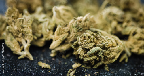 Medical Marijuana Buds on black background. Dried Cannabis Plant closeup