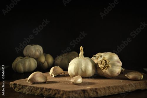 garlic on black background