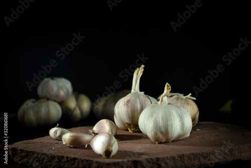 garlic on black background
