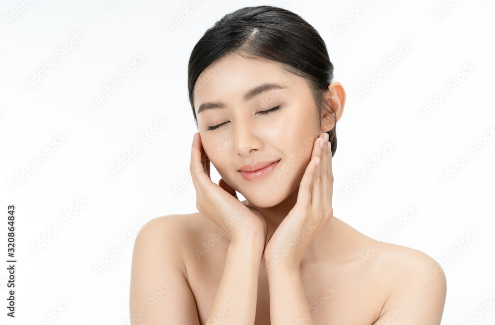 Beautiful young Asian woman with beauty skin healthy touching her own ...