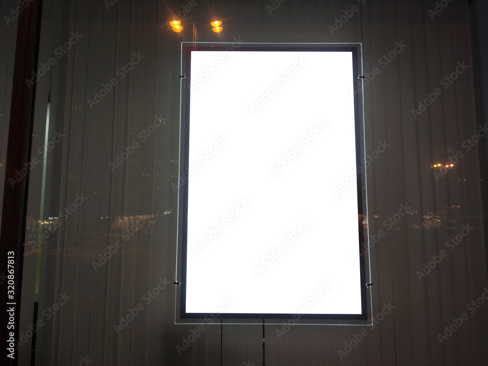 advertising poster in the window on the display window glowing. advertising poster in the window on the display window glowing.