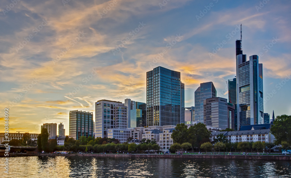 Skyline of Frankfurt at the Main river during sunset