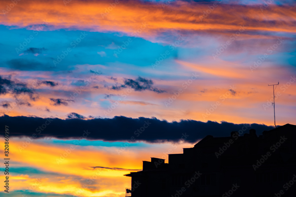 Red and yellow clouds in the sunset sky Red and yellow clouds in the sunset sky