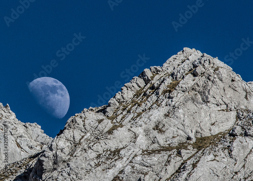 moon over the mountain summits