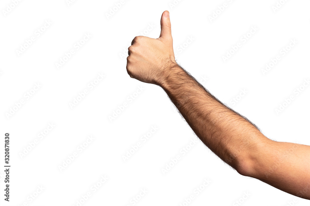Hairy man hand showing thumb up sign isolated on white background. Hairy man hand showing thumb up sign isolated on white background.
