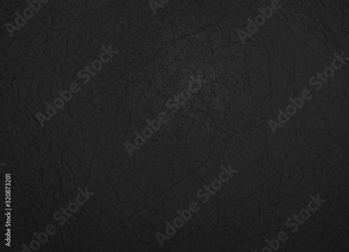 Texture of vintage dark paper background.