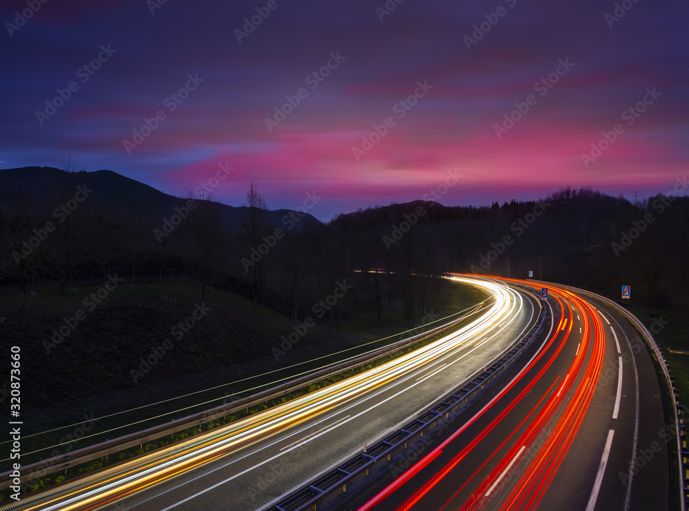 Car lights on the highway at night, Gipuzkoa