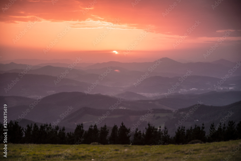 Fototapeta premium sunset over the hills in basque country, spain