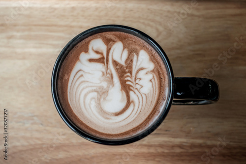 Hot Cappuccino coffee with Beautiful latte art	 photo