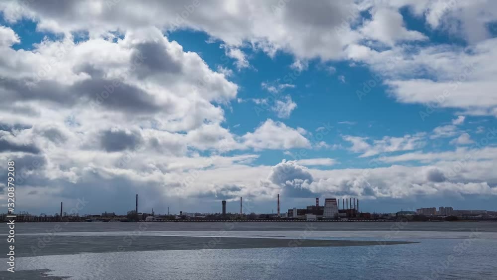 Beautiful clouds in the blue sky above the city. Beautiful clouds in the blue sky above the city.