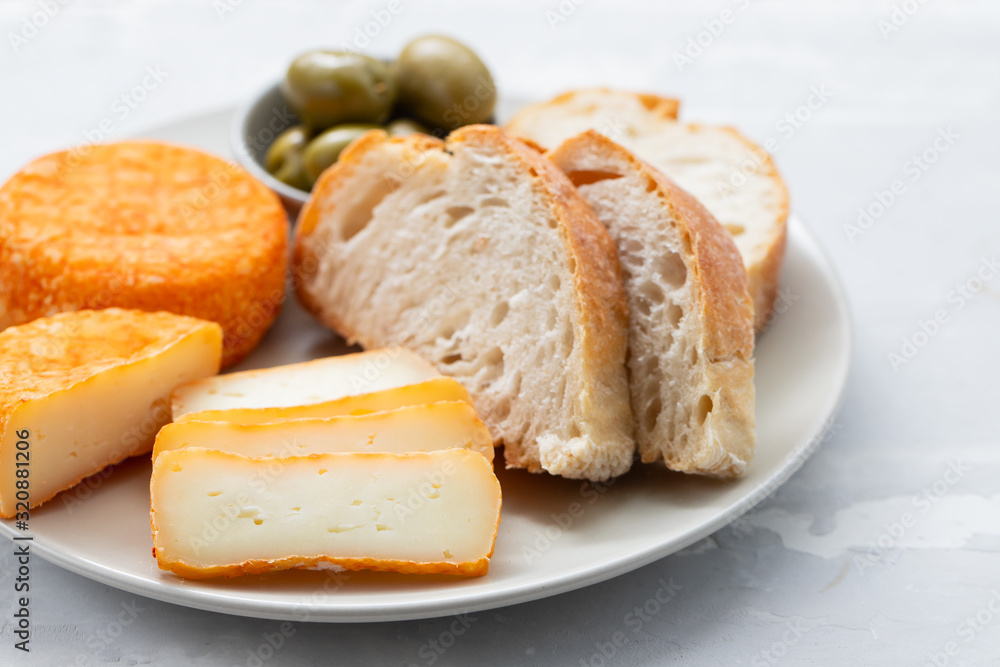 appetizer cheese with bread and olives on dish appetizer cheese with bread and olives on dish