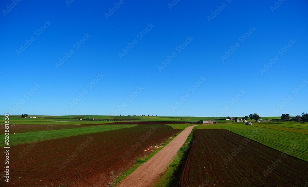 Bright landscape of Morocco, breathtaking curves of mountains, stunning combination of hills & farm land,inadvertent distribution of houses & huts, raw impression of pure nature. Bright landscape of Morocco, breathtaking curves of mountains, stunning combination of hills & farm land,inadvertent distribution of houses & huts, raw impression of pure nature.