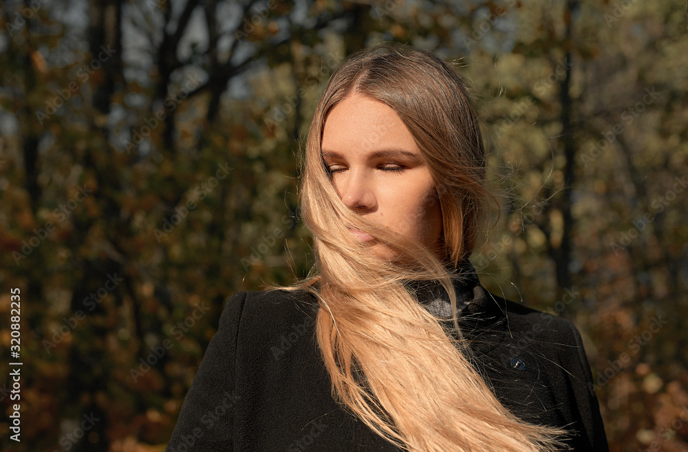 Portrait of a young girl on a sunny day in autumn. Portrait of a young girl on a sunny day in autumn.