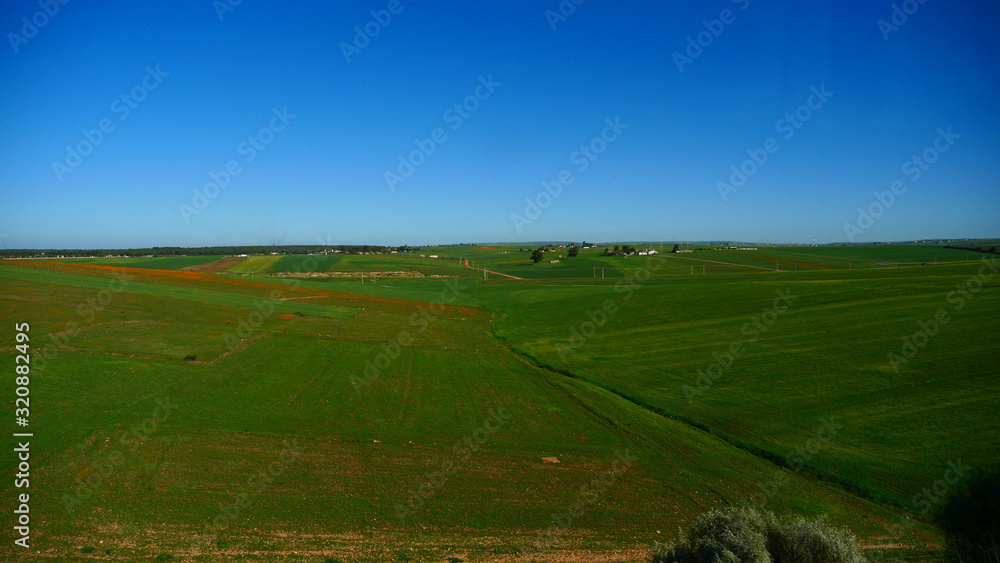 Bright landscape of Morocco, breathtaking curves of mountains, stunning combination of hills & farm land,inadvertent distribution of houses & huts, raw impression of pure nature. Bright landscape of Morocco, breathtaking curves of mountains, stunning combination of hills & farm land,inadvertent distribution of houses & huts, raw impression of pure nature.