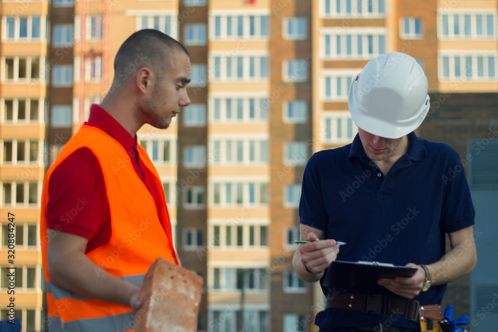 customer in stress and constructor foreman worker with helmet and vest