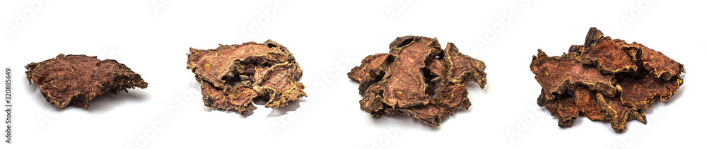 Dry root of Rhodiola rosea on a white isolated background Dry root of Rhodiola rosea on a white isolated background