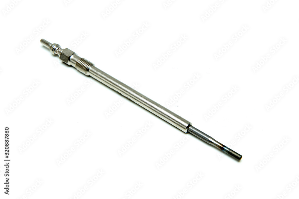 The new glow plug for diesel engines isolated on a white background. The new glow plug for diesel engines isolated on a white background.