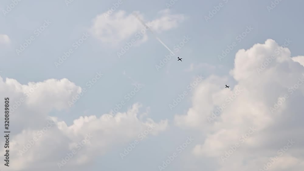 3 fighter jets in the blue sky. A general plan. Aerobatic figures. Airshow. 8 seconds 3 fighter jets in the blue sky. A general plan. Aerobatic figures. Airshow. 8 seconds