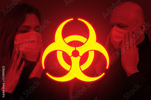 Glowing biohazard sign on t...