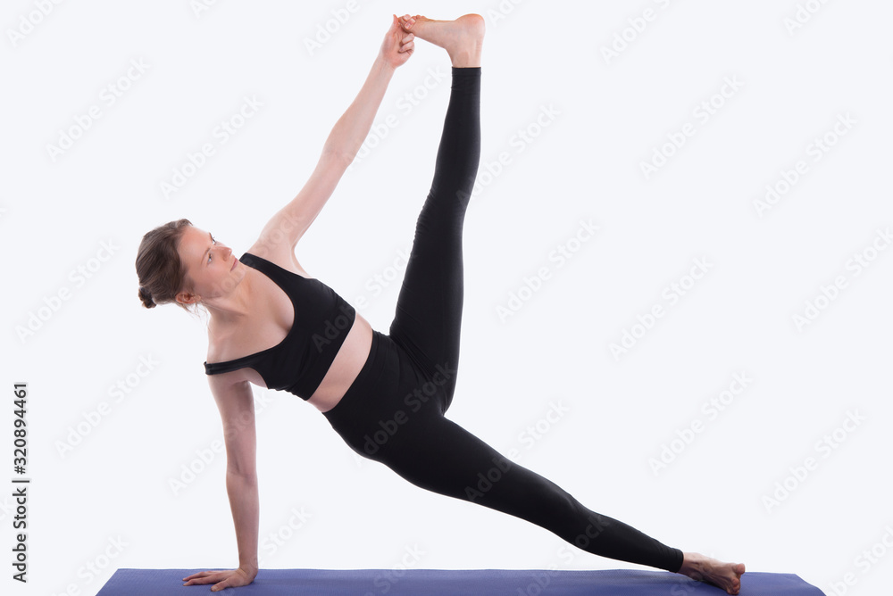 Woman practicing yoga on white background (side plank pose, vasisthasana)