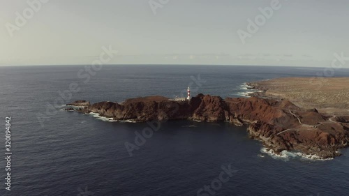 video 1The camera flies to an old lighthouse standing on a rocky cape. Tenerife, Cape Teno photo