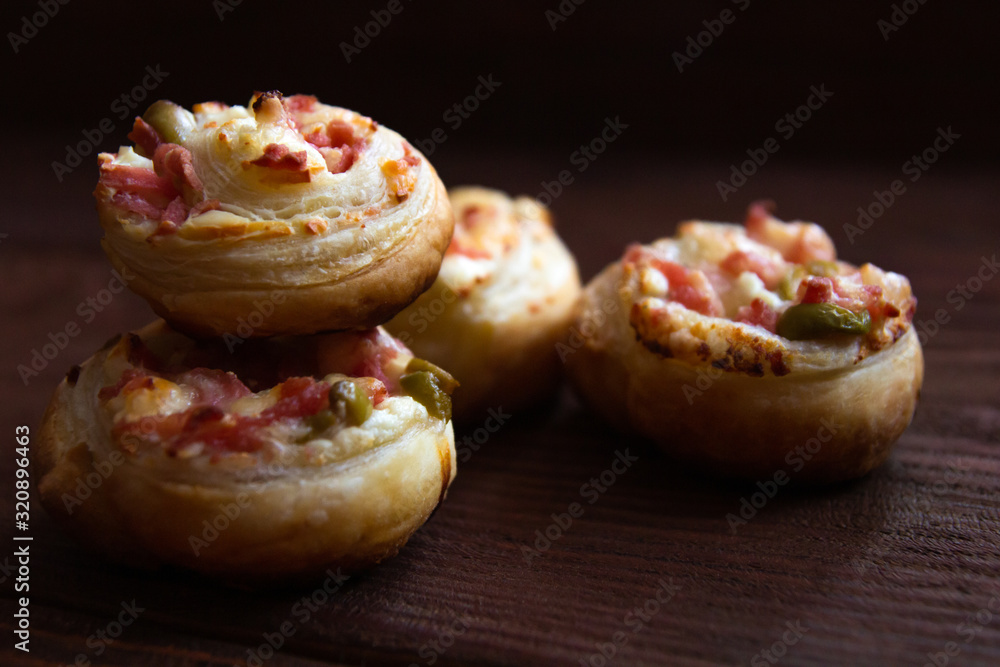 baked roll with bacon, cheese and olives baked roll with bacon, cheese and olives