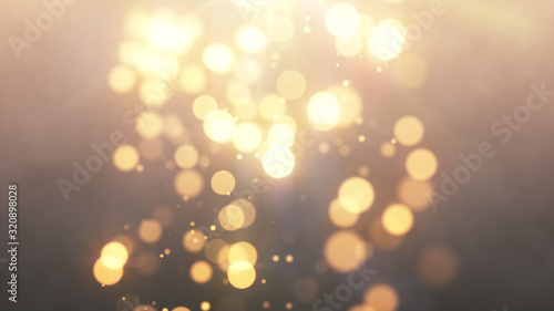 Bright gold bokeh lights abstract background. Flying golden particles or dust. Vivid lightning. Merry christmas design. Blurred light dots. Can use as cover, banner, postcard, flyer.