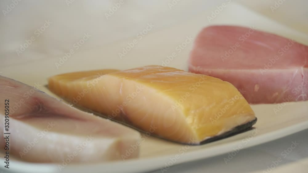 Beautifully plated tuna fish in a restaurant, white dish Beautifully plated tuna fish in a restaurant, white dish