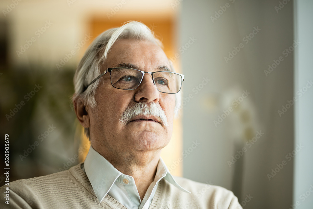 Portrait of pensive senior man at home. Portrait of pensive senior man at home.